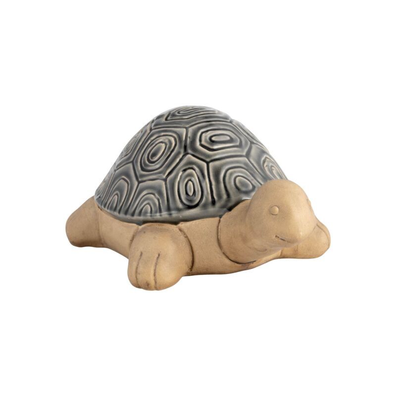 a turtle statue on a white background