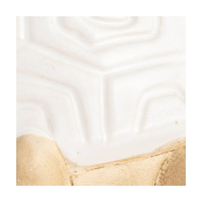 a close up of a white surface
