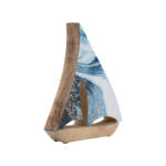 a wooden sailboat sculpture