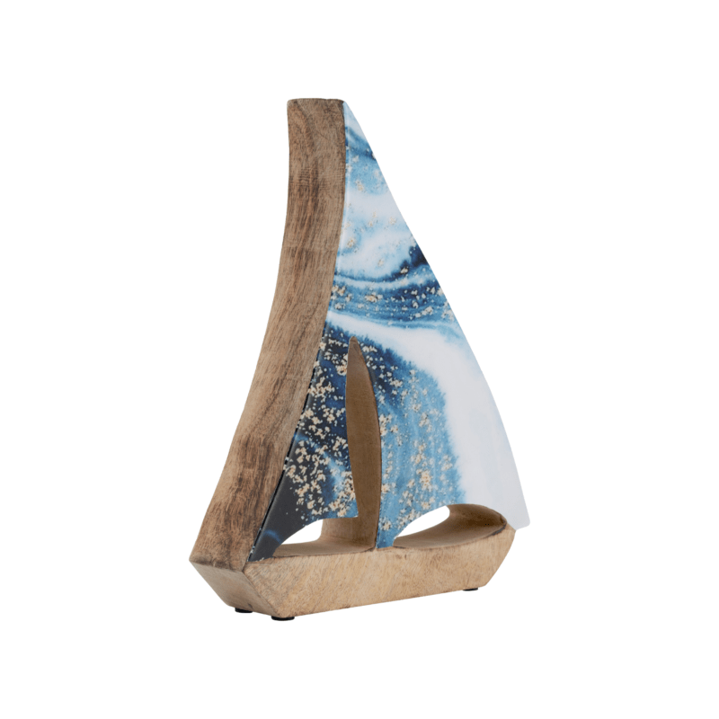 a wooden sailboat sculpture