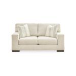 a white couch with pillows
